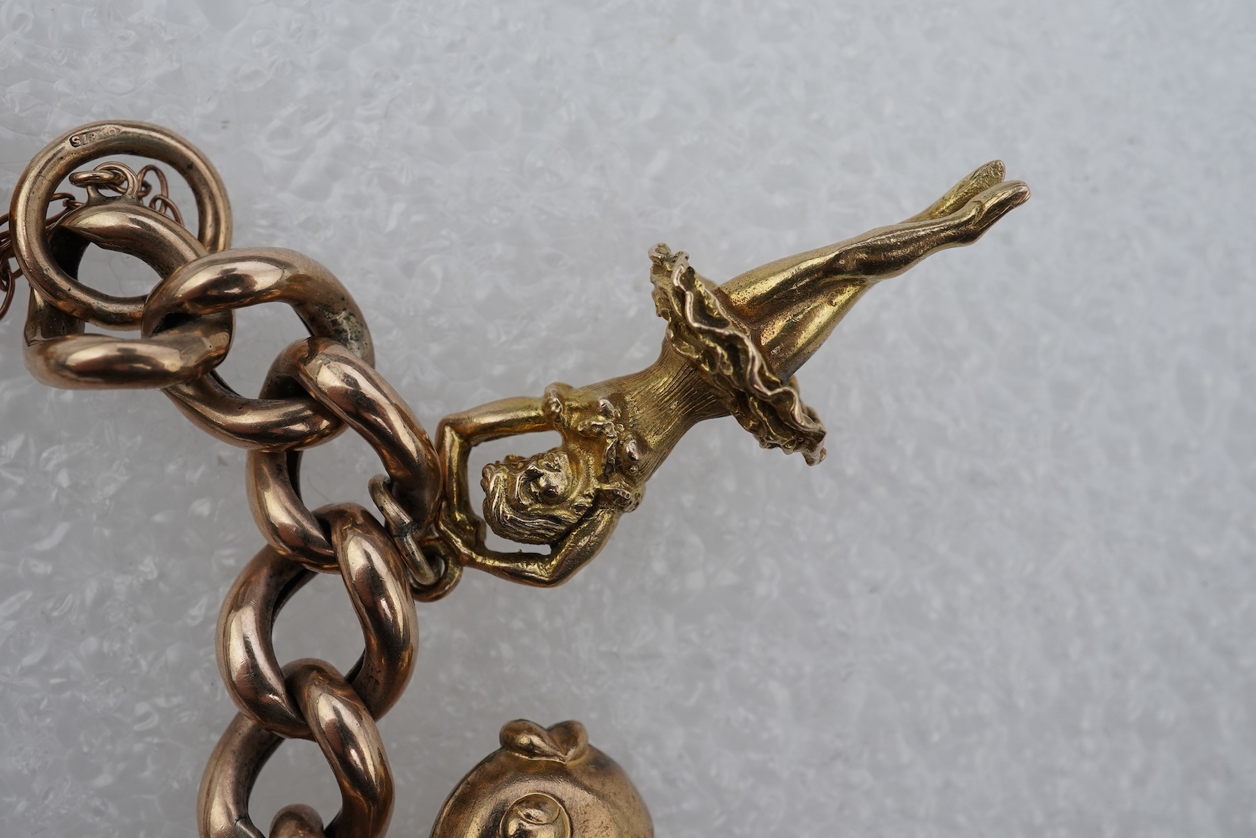 A 9ct gold charm bracelet